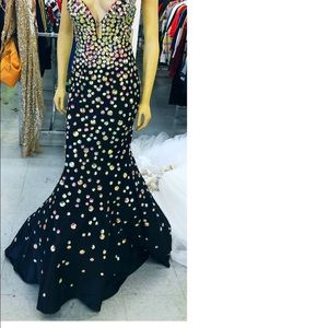 JOVANI mermaid style gown with jewel detailing